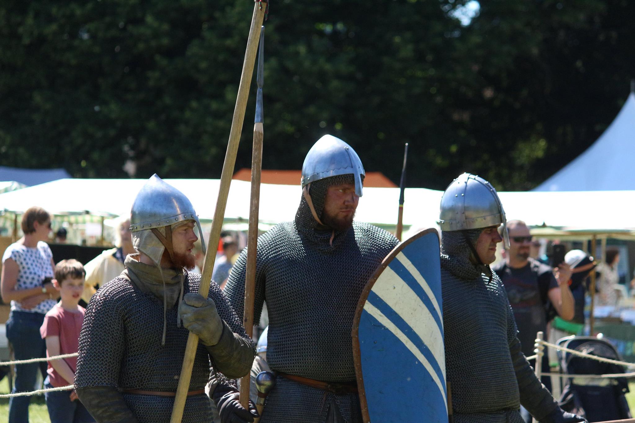 Some re-enactors prepare for battle